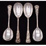 A set of four Victorian silver Bacchanalian pattern spoons, maker H J Lias & Son, London,