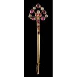 A ruby and diamond pin brooch: set with circular rubies and old-cut diamonds,
