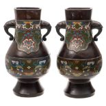 A pair of late 19th Century Chinese bronze and cloisonne vases: of ovoid form,