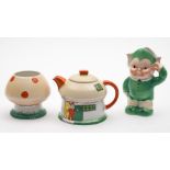 A Shelley porcelain Boo Boo tea set: after a design by Mabel Lucie Attwell and comprising a cottage