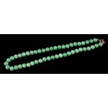 A jade bead single-string necklace: each bead between 7mm and 8mm diameter, on bolt ring clasp,
