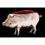A George V novelty silver pin cushion, maker's mark rubbed, Birmingham, 1920: in the form of a pig,