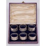 A set of six George V silver napkin rings, maker Joseph Gloster Ltd, Birmingham, 1928: numbered 1-6,