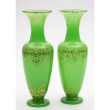 A pair of French green and gilt opaline glass vases: of baluster form,