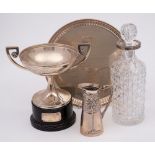 A white metal twin-handled trophy cup,
