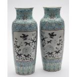 A pair of Chinese slender ovoid vases in Dayazhai style: painted en grisaille with panels of birds