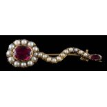 A 19th century stylised 'Halley's comet' brooch: with foil-backed garnet comet and tail tip,