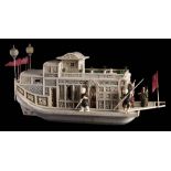 A 19th century Cantonese carved ivory model of a pleasure junk: the pagoda style superstructure