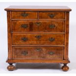 An early 18th Century yew-wood and walnut veneer fronted chest:,