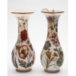 A pair of French opaline glass vases: attributed to Baccarat, with slender waisted necks,