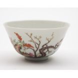 A small Chinese famille rose flared bowl: painted with sheep in a continuous landscape with