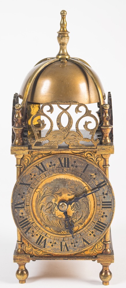 An Edwardian brass lantern clock-style carriage clock: the eight-day duration movement having a