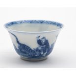 A small Chinese blue and white wine cup: with flaring rim,