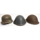 A MKIII 'turtle' steel helmet: together with a Czechoslovakian steel helmet and a reproduction