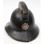 A mid 20th century Sunderland Fire Brigade Merryweather pattern cork helmet: black with high comb