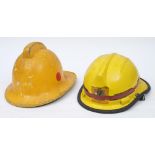 A mid 20th century Cromwell pattern fireman's helmet by Helmets Ltd: style F 535 in yellow with