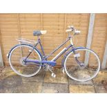 A Raleigh 'Trent Tourist' lady's bicycle: blue step through frame with original transfers,
