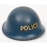 A mid 20th century Police MK III 'turtle' steel helmet: blue with transfer to front,