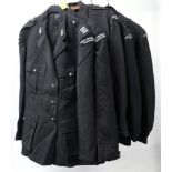Three Devonshire Constabulary Special Constable Reserve uniforms and two jackets.