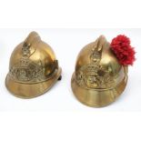 Two early 20th century French Fire Service brass helmets: for 'Courteron' and 'De Ham',