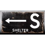 A WWII enamel Air Raid Shelter sign 'S Shelter' with direction arrow: white text on black ground,