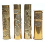 A pair of Trench Art vases: with stipple ground and repousse decoration,