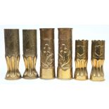 Three pairs of WWI Trench Art vases: with stipple ground and repousse decoration (6)