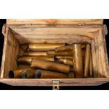 A collection of WWII and later shell cases in an associated wooden armour case: (a lot)