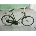 A Raleigh all steel bicycle: black frame with plated handlebars, bar brakes,