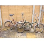 A BSA Shopper bicycle together with a Raleigh Stowaway bicycle: (2)