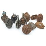A collection of various Mills bomb and other grenade cases: including several rifle grenades (some