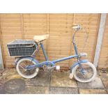 A Raleigh RSW Mk II bicycle: blue step through frame with white lettering: chrome plated handle