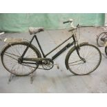 A New Hudson lady's bicycle: black step through frame with plated handlebars, bar brakes,