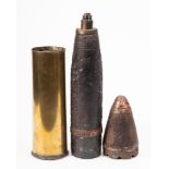 A WWI artillery shell in associated shell case,