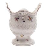 A rare Chelsea 'rococo' pedestal ice bucket: with shell and acanthus moulded handles and rim,