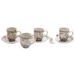 A set of four Chinese famille rose European-subject coffee cups and three saucers: painted with an