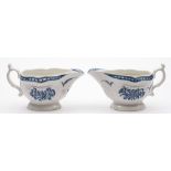 A pair of First Period Worcester blue and white sauceboats: each of strap-fluted form with double