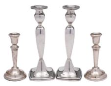 A pair of Sterling silver candlesticks, stamped marks: initialled,