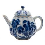 A small Chinese blue and white teapot and cover: of chrysanthemum moulded form with bud finial,