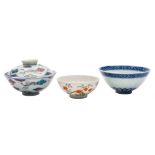 A group of three Chinese bowls: comprising a small bowl finely painted with two knarled branches of