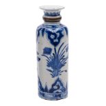 A Chinese blue and white cylindrical bottle vase: with knopped neck and painted with peony sprays