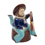 A William Brownfield & Son majolica teapot and cover in the form of an Isle of Man 'Manx Sailor':