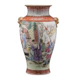 A Chinese famille rose baluster vase: with gilt lion dog ring handles,