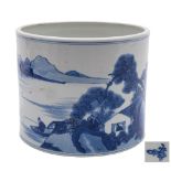 A large Chinese blue and white cylindrical brush pot,