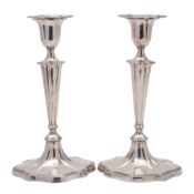 A pair of George V silver candlesticks, maker Goldsmiths & Silversmiths Co Ltd, London,