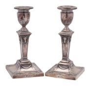 A pair of Edward VII silver candlesticks, maker Goldsmiths & Silversmiths Co Ltd, London,