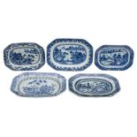 A group of five Chinese blue and white octagonal dishes: painted with traditional garden and pagoda