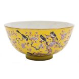 A Chinese yellow-ground 'Magpie and Prunus' bowl: finely painted with magpies perched and flying