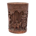 A Chinese carved bamboo brush pot, Bitong: with traditional decoration of a village scene,