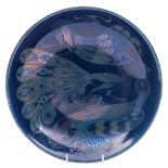 Charles Passenger for William de Morgan a shallow dish: decorated in silver,